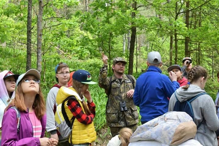 Dmitry Belyaev and environmental school participants